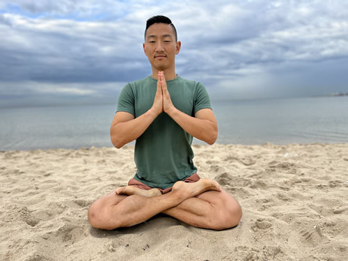 Kiego Meditating at the Beach